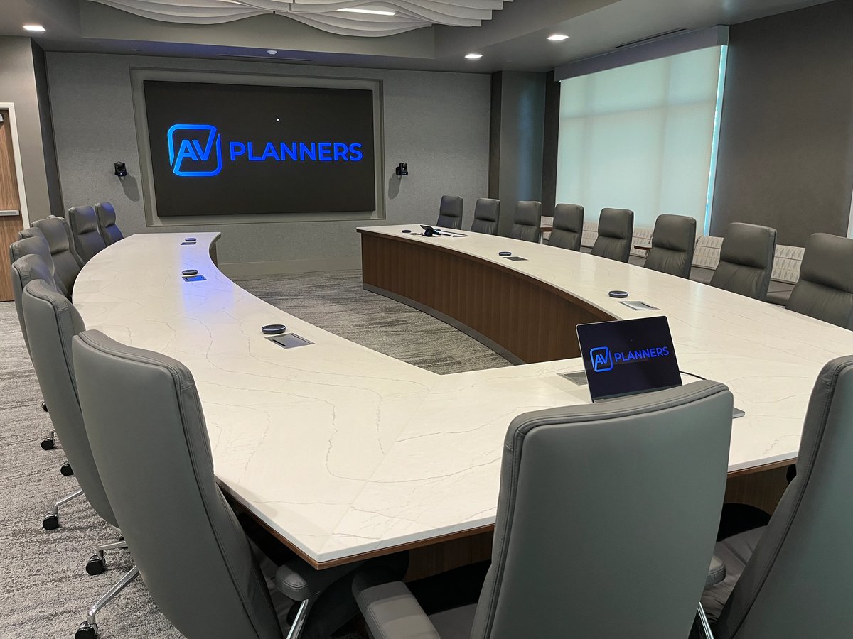 Valley Children’s Hospital conference room with a large display, video conferencing cameras, tabletop microphones, and touch controller