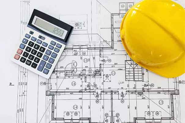 close-up-of-house-blueprints-with-yellow-helmet-21-1